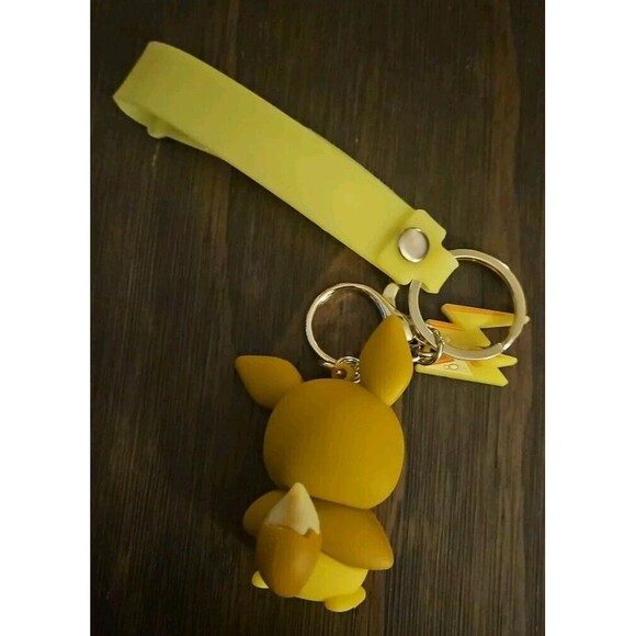 Pokemon Pikachi Evee Disguise Keychain with Lightning Bolt Charm - Picture 3 of 3